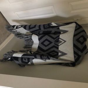 A sleeveless sweater to go over a top